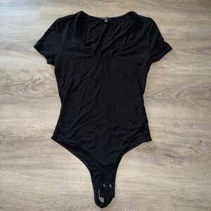Dynamite Black Short Sleeve Snap Bodysuit
